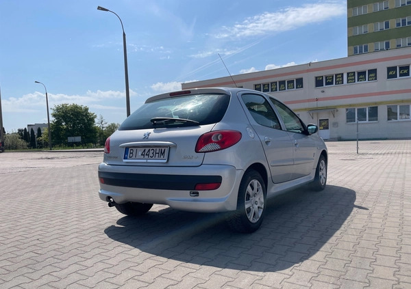 Peugeot 206 plus cena 13599 przebieg: 264620, rok produkcji 2012 z Białystok małe 46